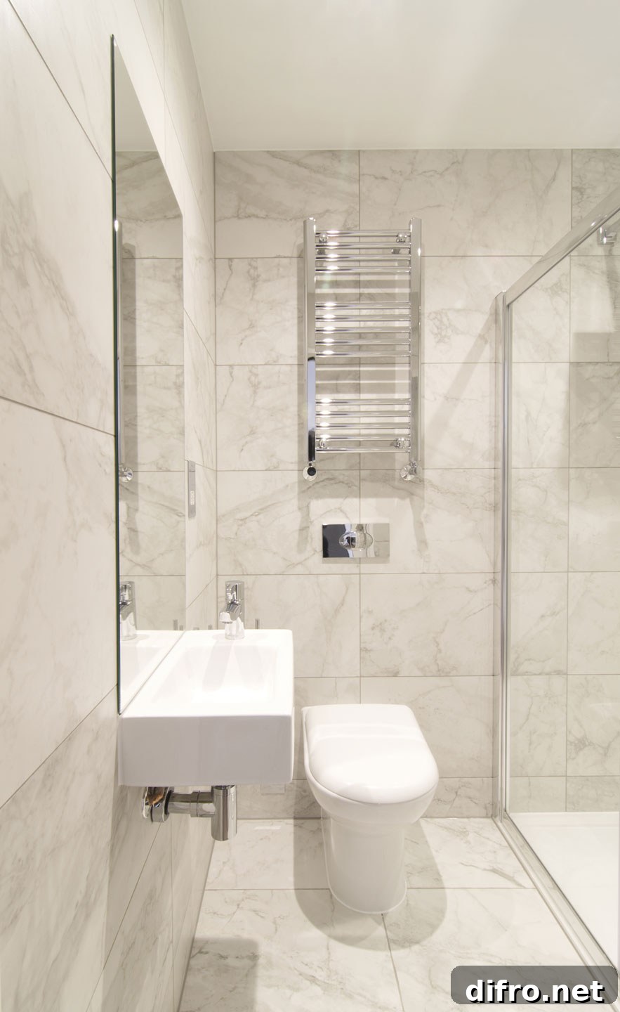 Small contemporary bathroom in white with glass shower area