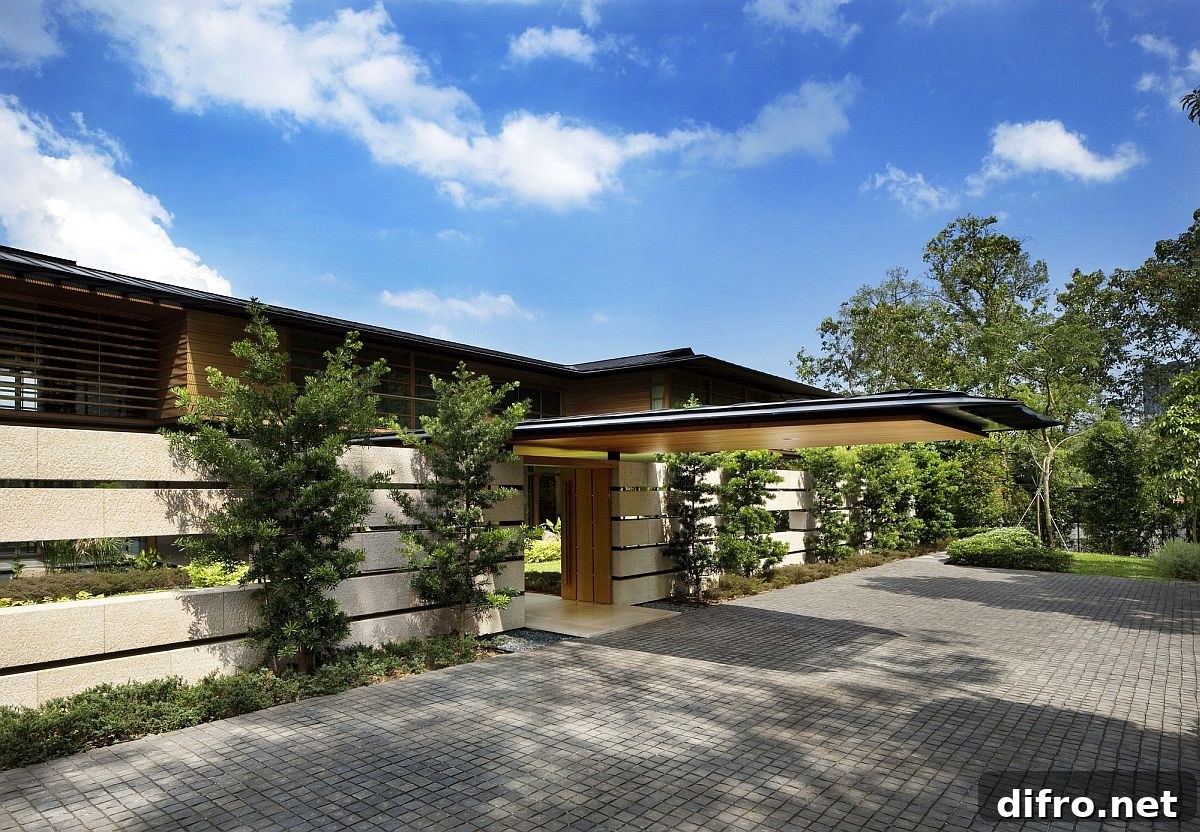 Extended roof structures provide shade at the modern Singapore home
