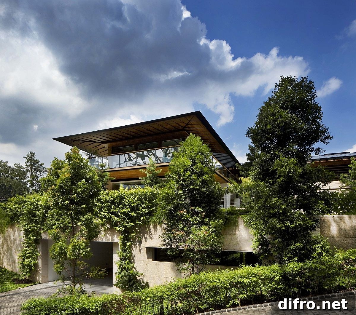 Lush landscaping enveloping the house creates a private natural retreat
