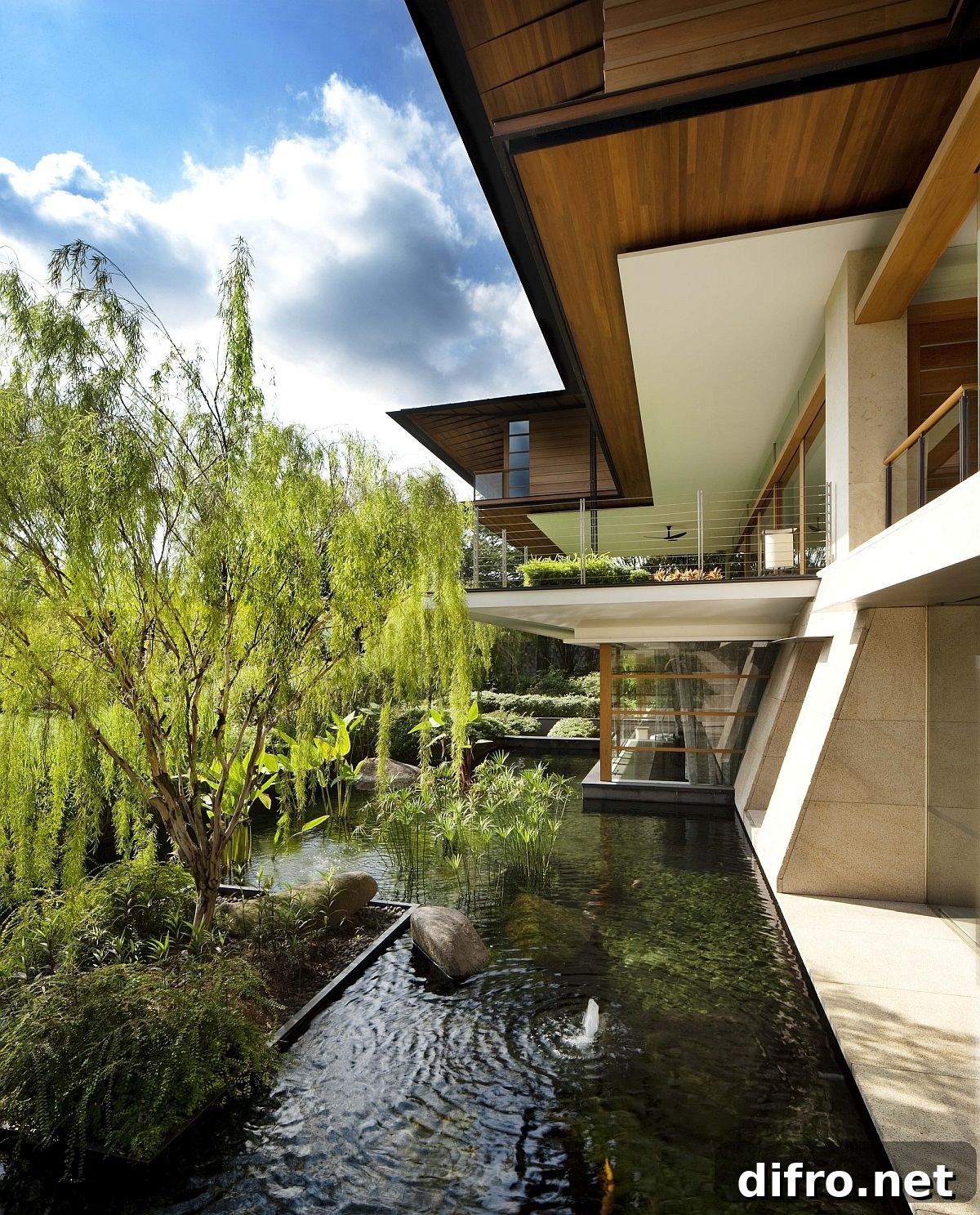 Series of ponds and gardens around the picture-perfect home in Singapore