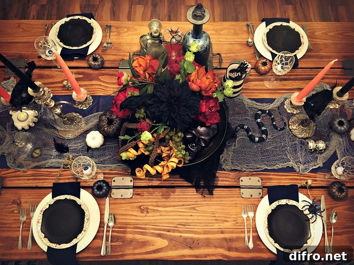 Small snake and cobweb details on a tablescape