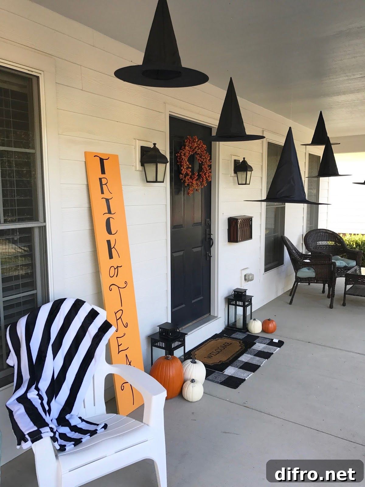 Witch hats and pumpkins on porch