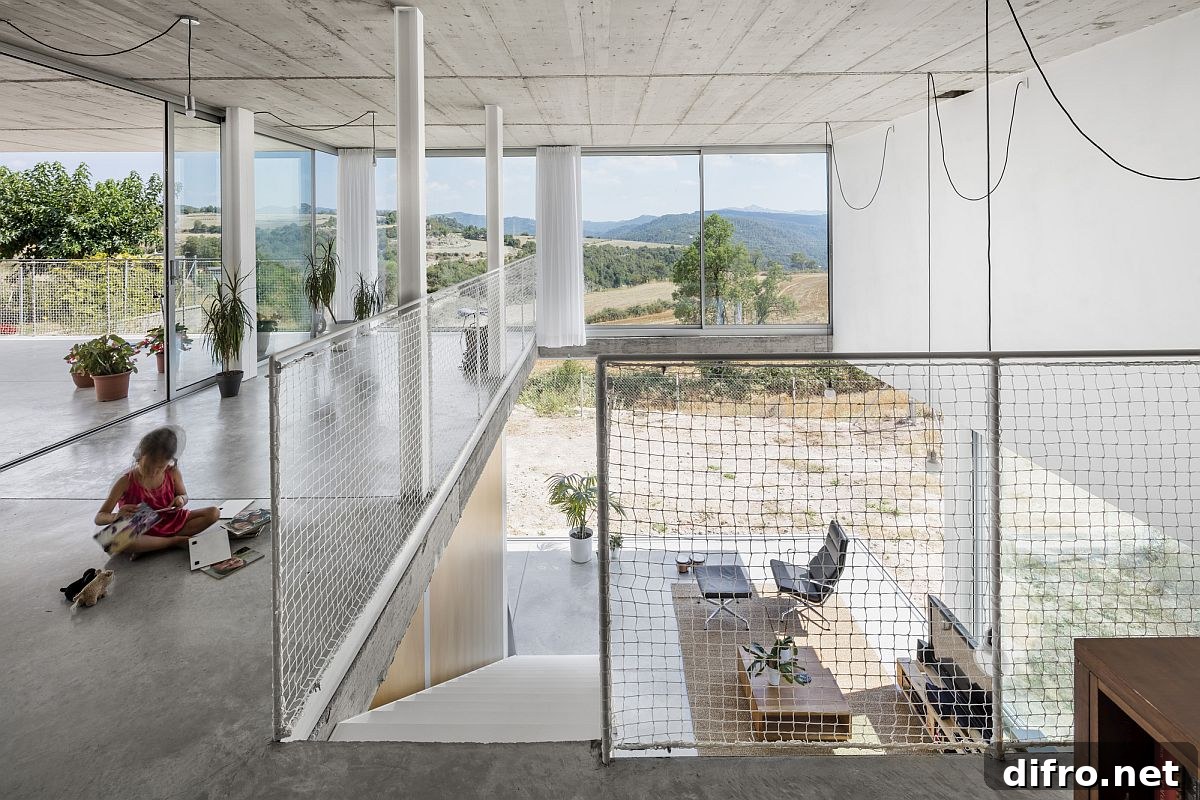 Ramp leading to the upper level of the house with an open and refreshing design