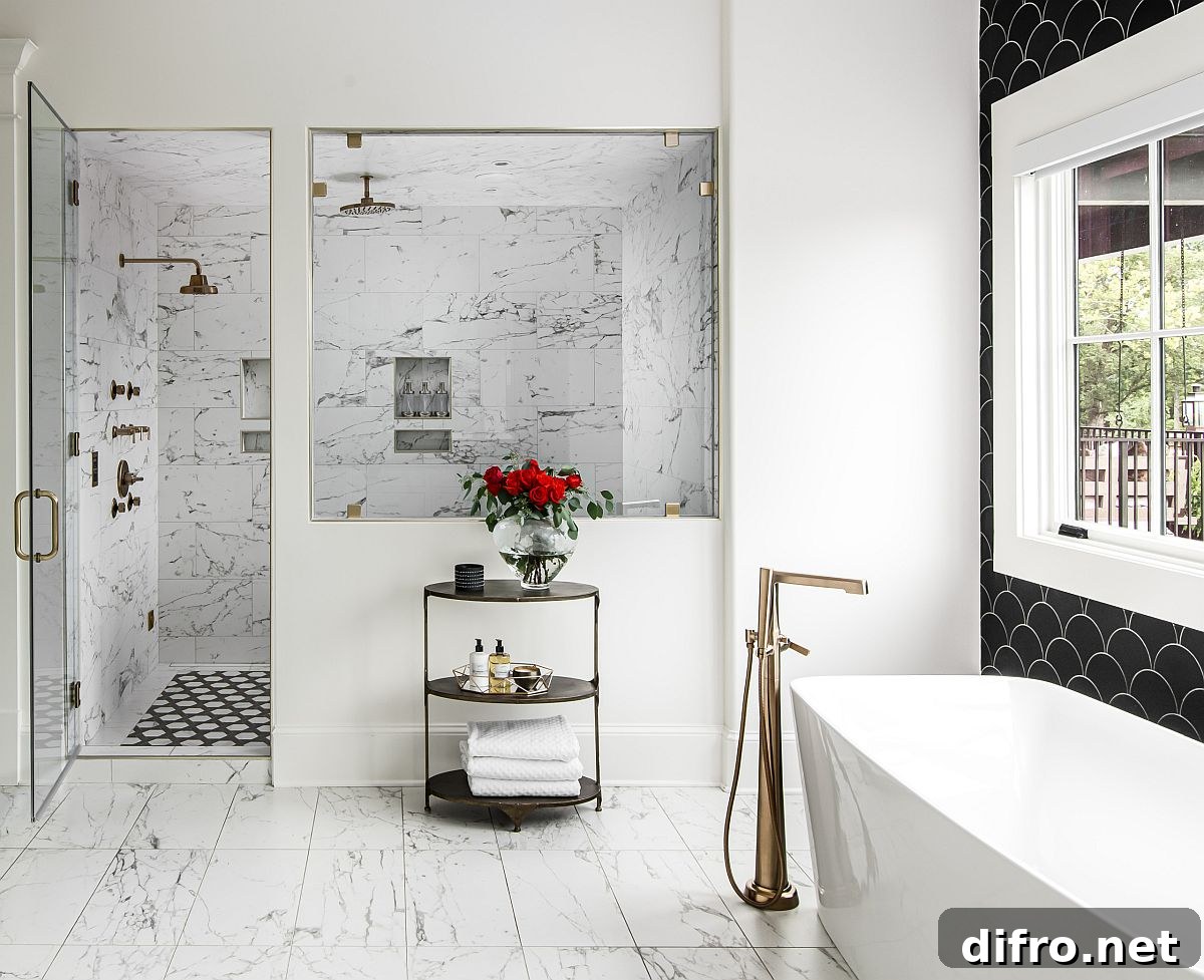 Contemporary black and white bathroom with a freestanding bathtub
