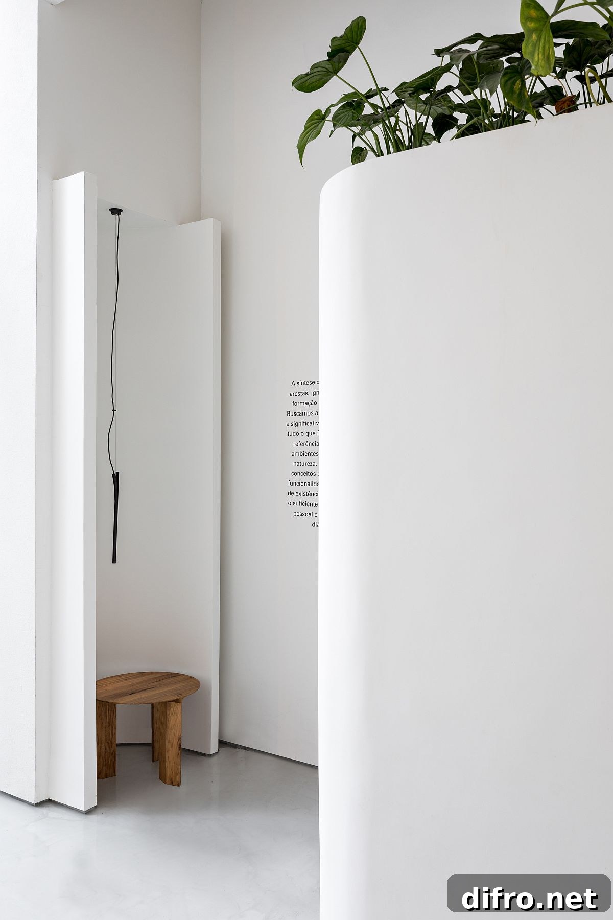 Greenery adds color to the neutral, monochromatic backdrop of the store in white