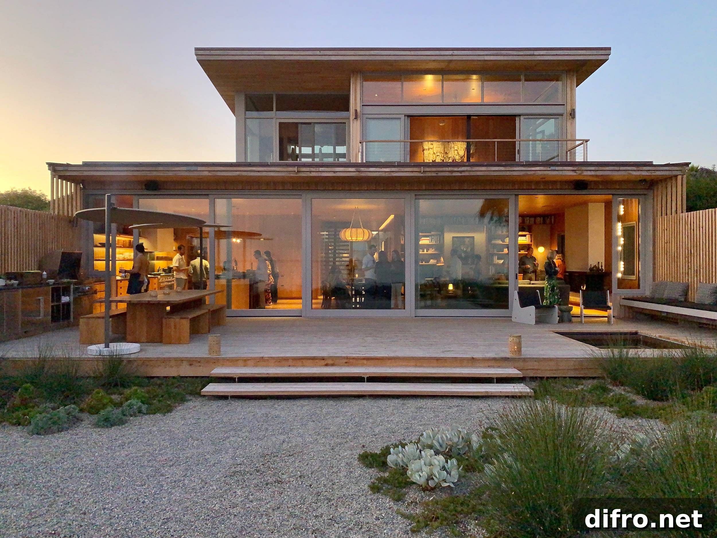 Beautiful rear section of the house with sliding glass doors brings the beach and ocean indoors