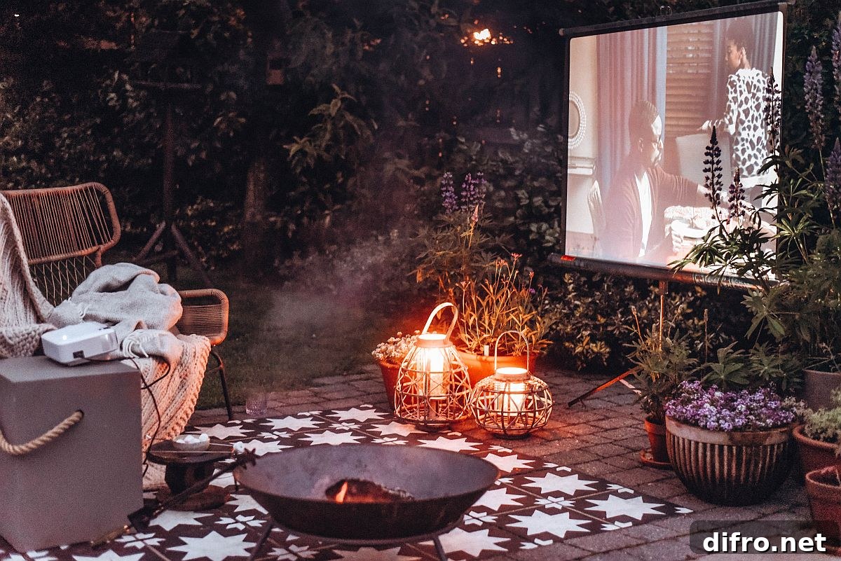 Cozy garden cinema setup with seating and projector