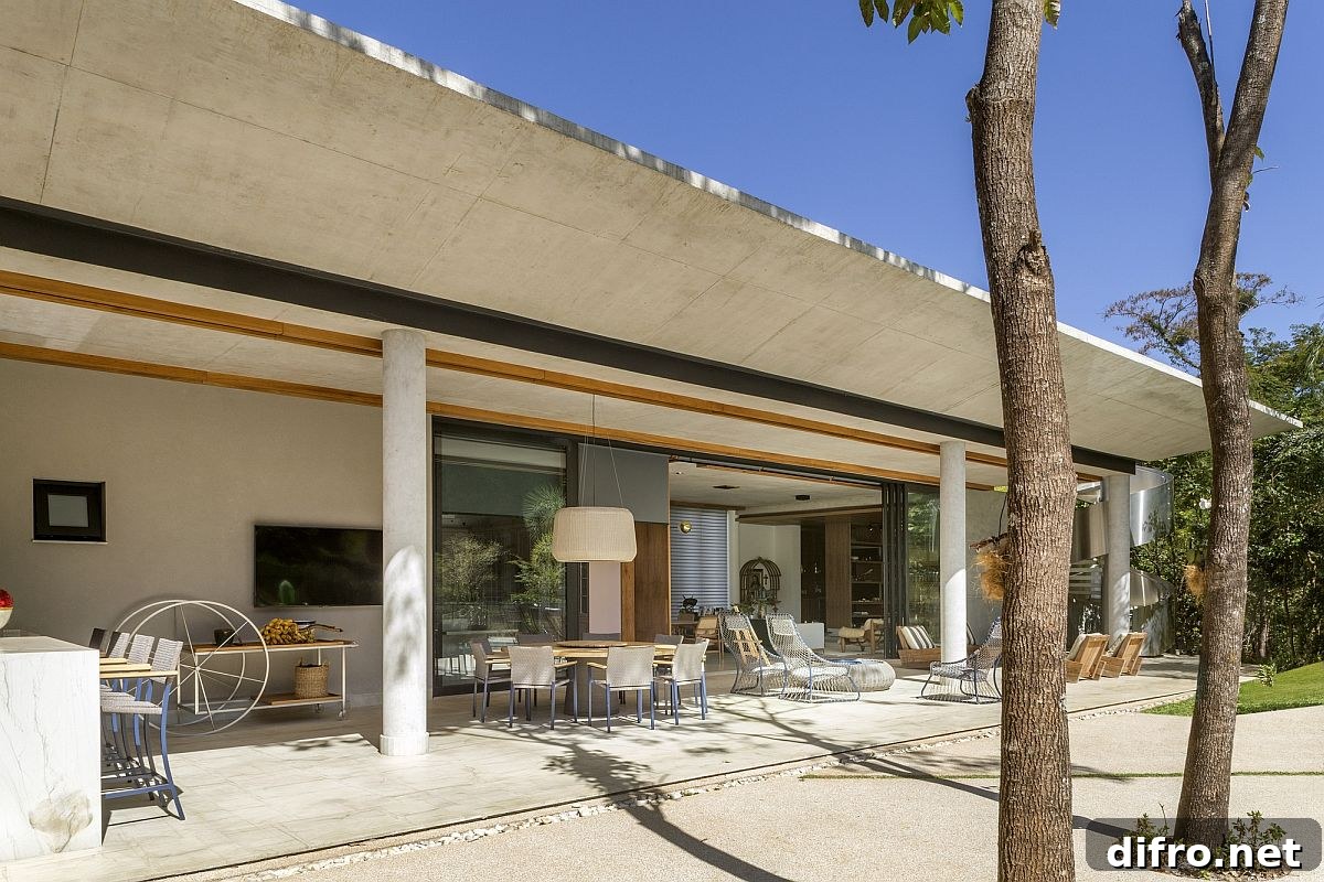 Sliding glass doors allow the interior to easily connect with the outdoors