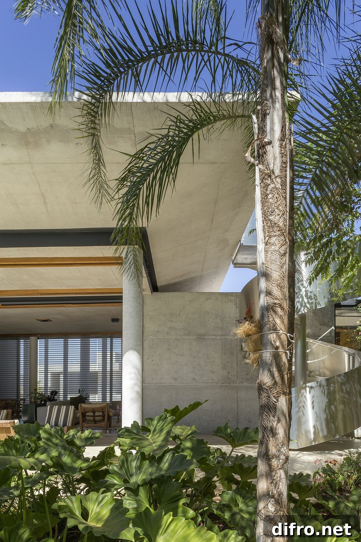 Gorgeous green landscape around the house brings an additional layer of privacy to the backyard