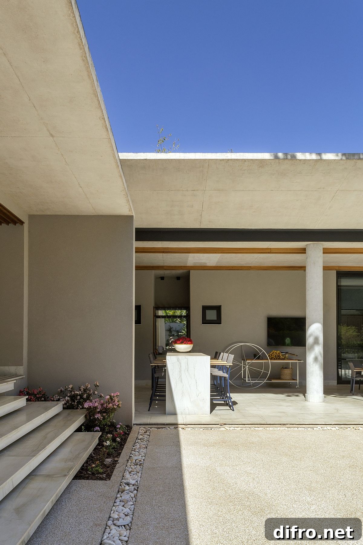 Marble countertops and modern decor add to the relaxed contemporary style of the home