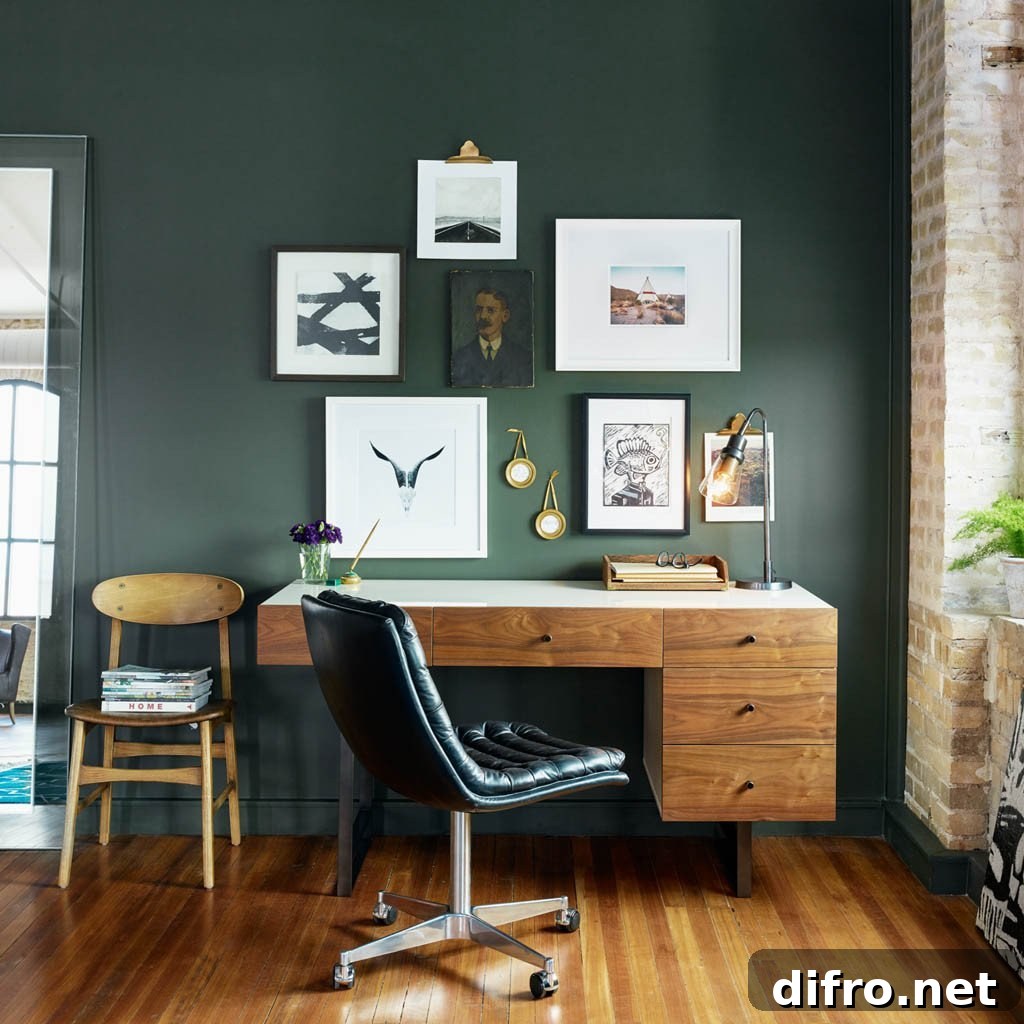 office with wooden desk and green accent wall