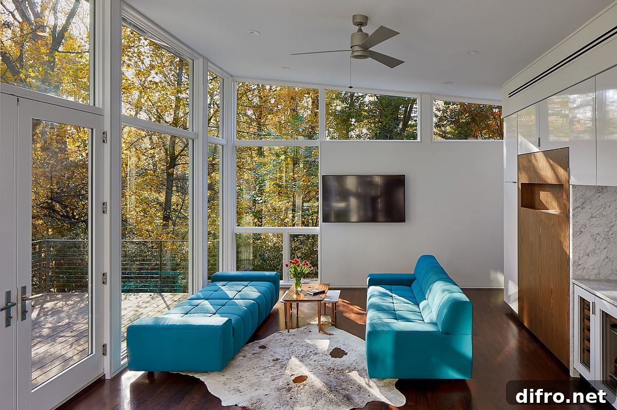 White living area with outdoor greenery