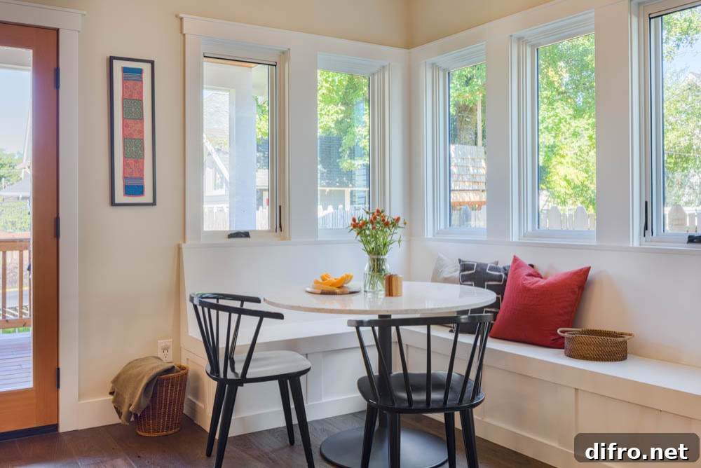 Combining a corner bench with chairs for a comfy nook