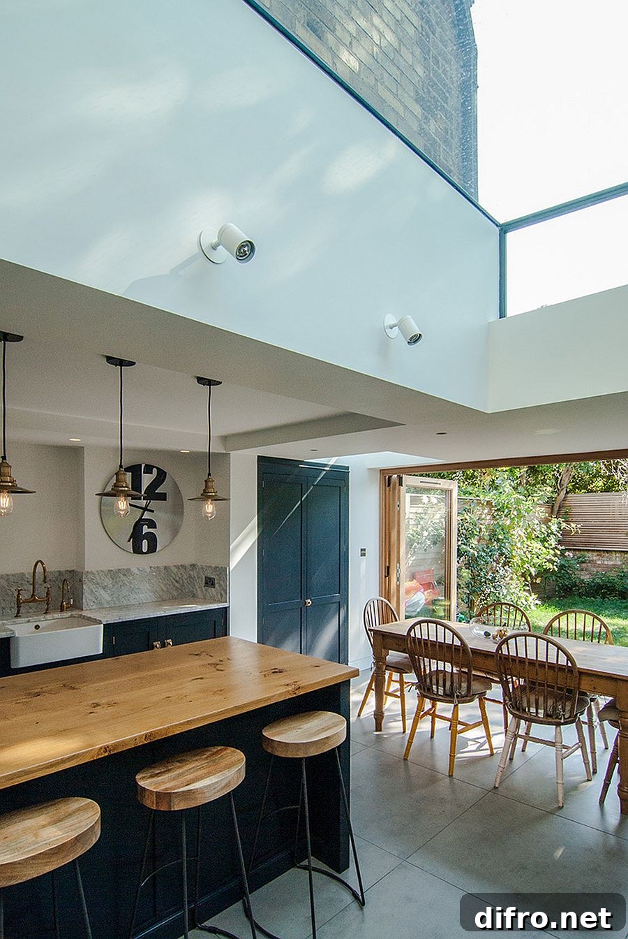 Glazed ceiling of the extension brings the sky indoors
