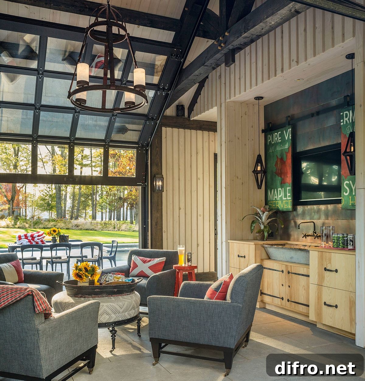 Innovative poster styled doors swing open to reveal the TV in this living space