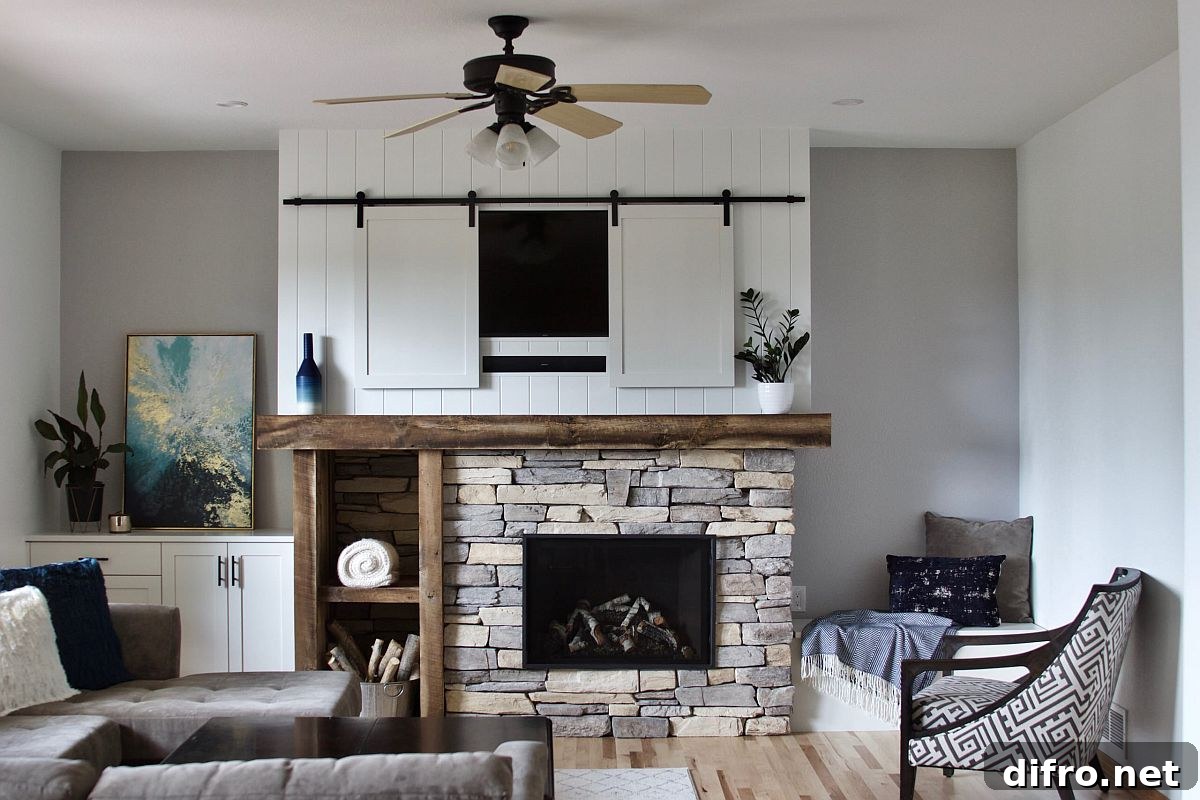 Sliding wooden panes conceal the television in a farmhouse style living space