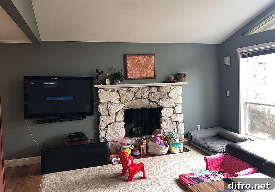 Before renovation: living room with the original fireplace