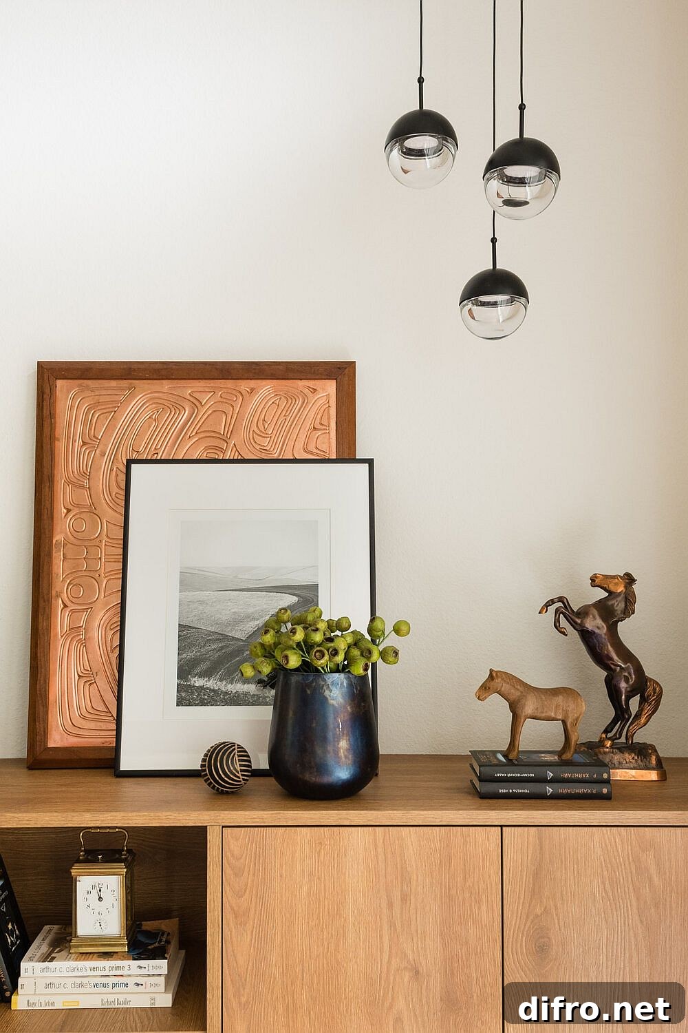 Decorated custom wooden credenza in the living room