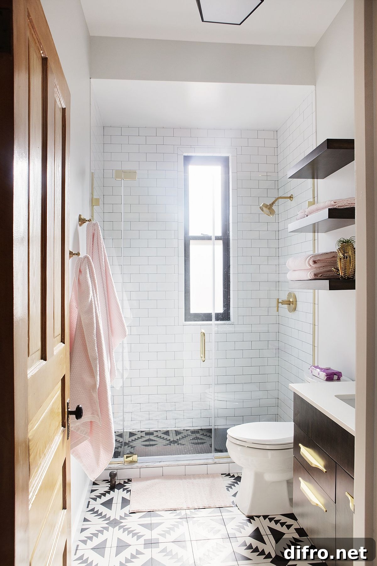 Tiles in black and white add pattern to the bathroom floor