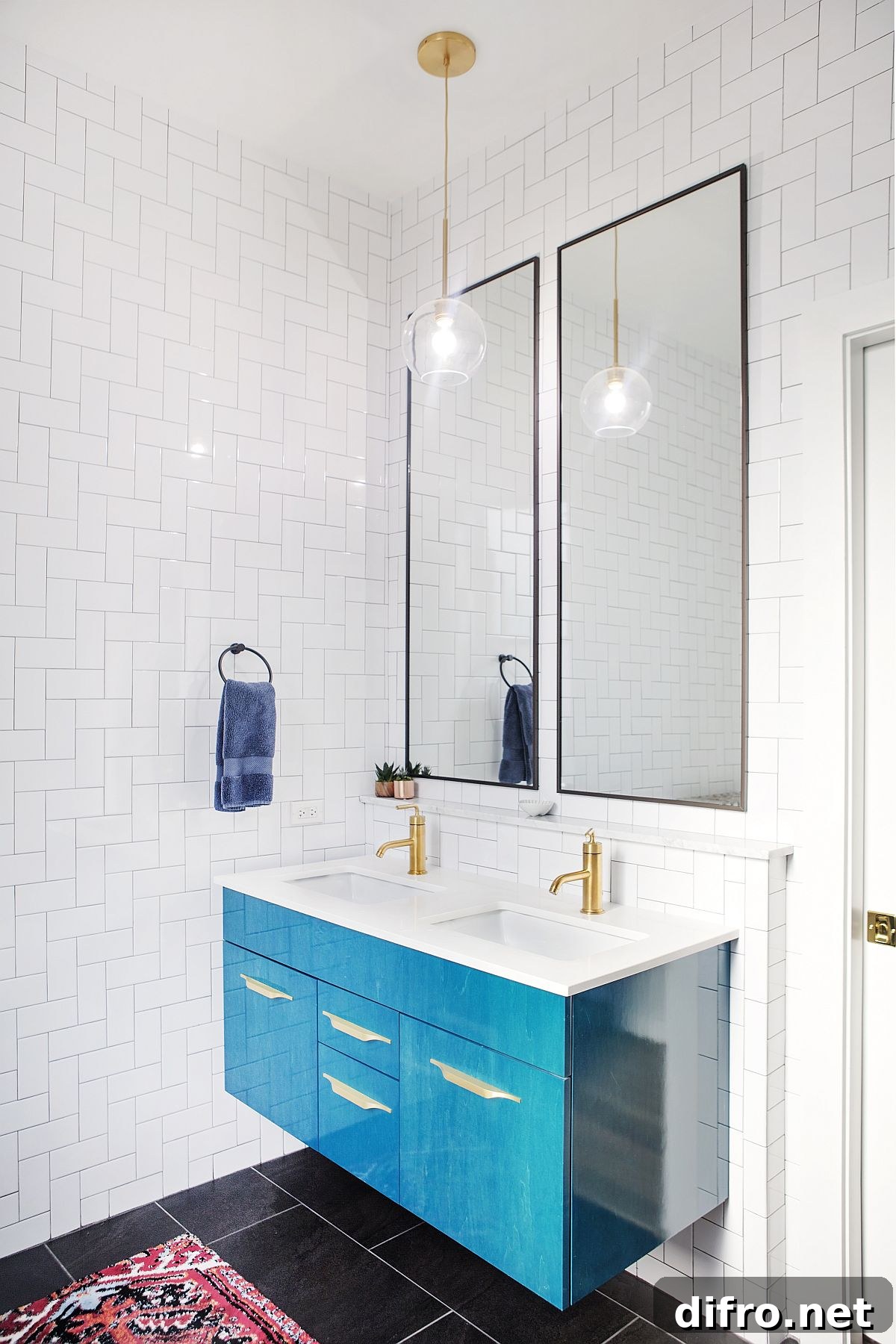 Blue vanity for the bathroom adds color and contrast to the space