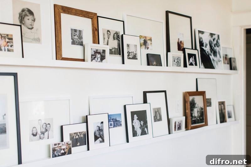 a gallery wall displayed on ledges rather than hung up