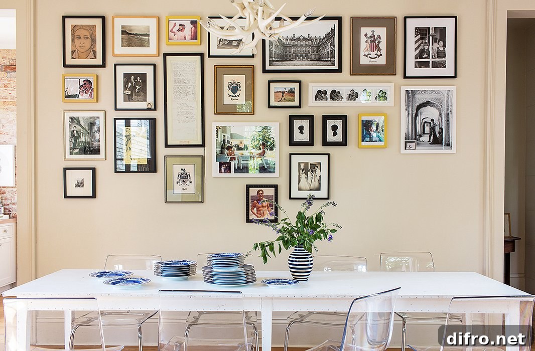a gallery wall with photos lined at the top