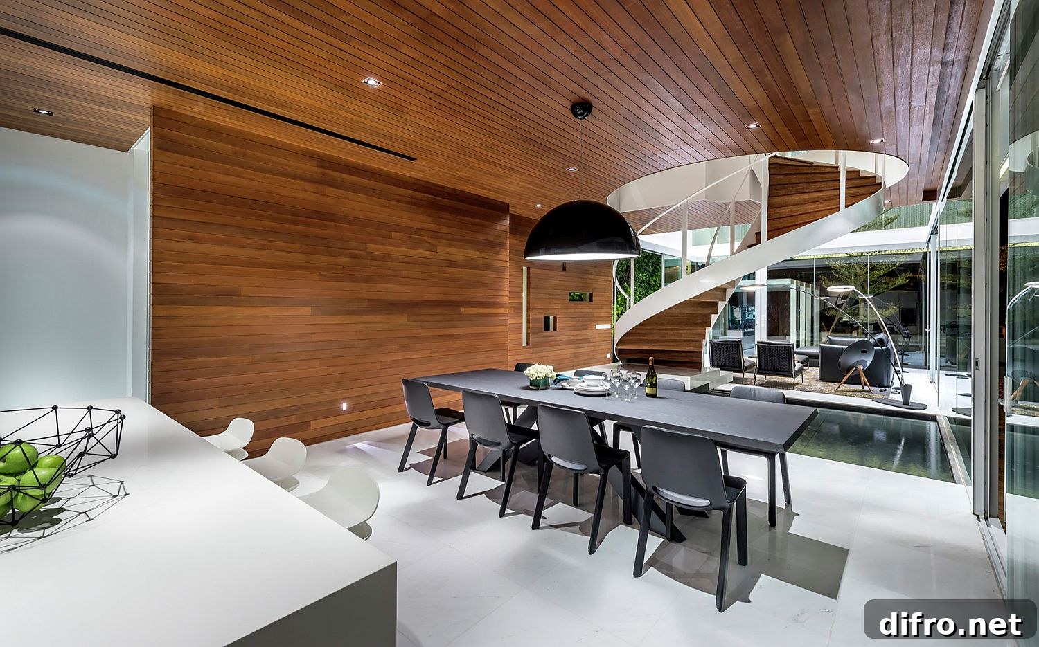 Dining area and kitchen of the house with wooden ceiling