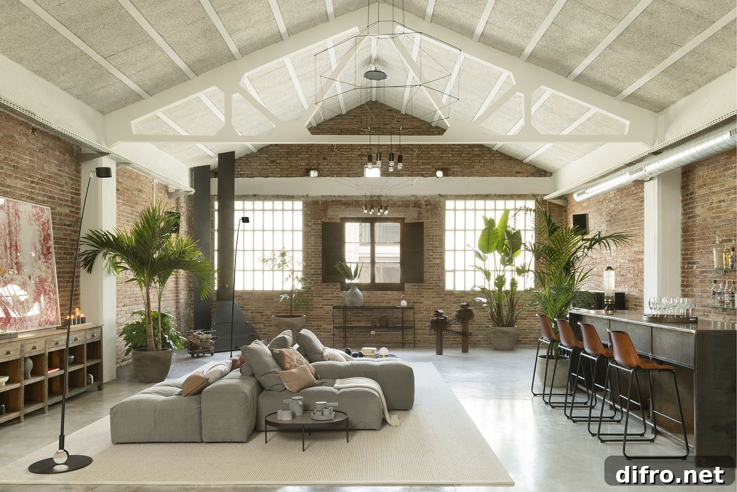 Modern industrial loft in Barcelona with brick walls and vaulted ceiling