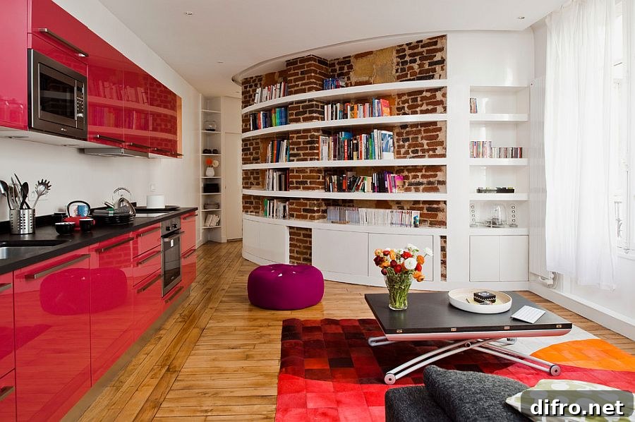 Creative way to highlight the curved brick wall in the living room [Design: Manuel Sequeira Architecte]