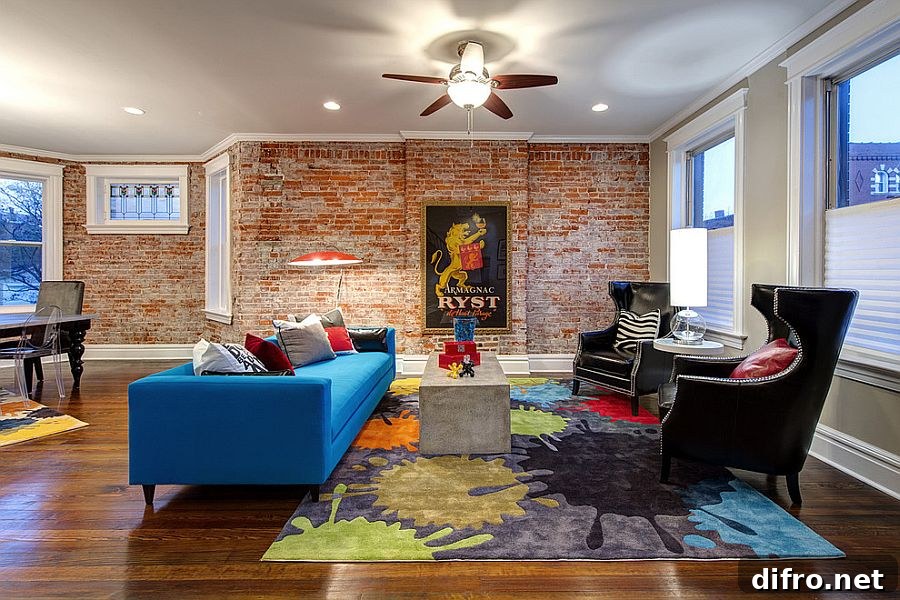 Colorful couch in blue, rug and plush chairs make a vivacious living room [Design: S&K Interiors]