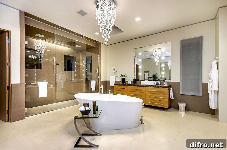 Cascading chandelier in luxurious bathroom