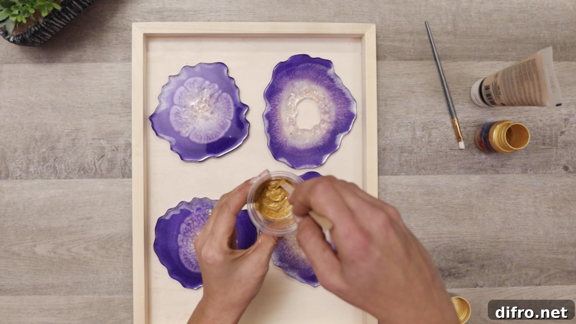mixing gold pigment into gold acrylic paint for edges