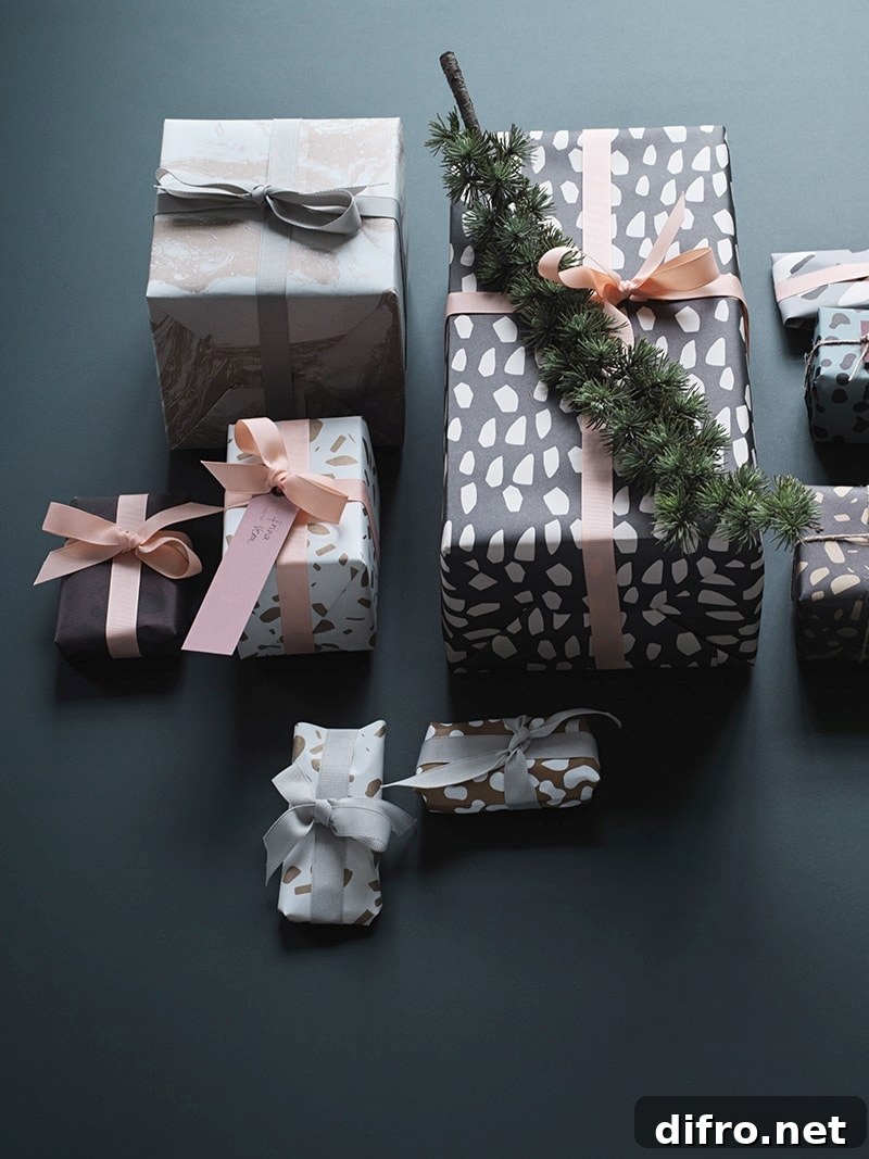 Gift wrapping book and wrapped presents arranged for inspiration