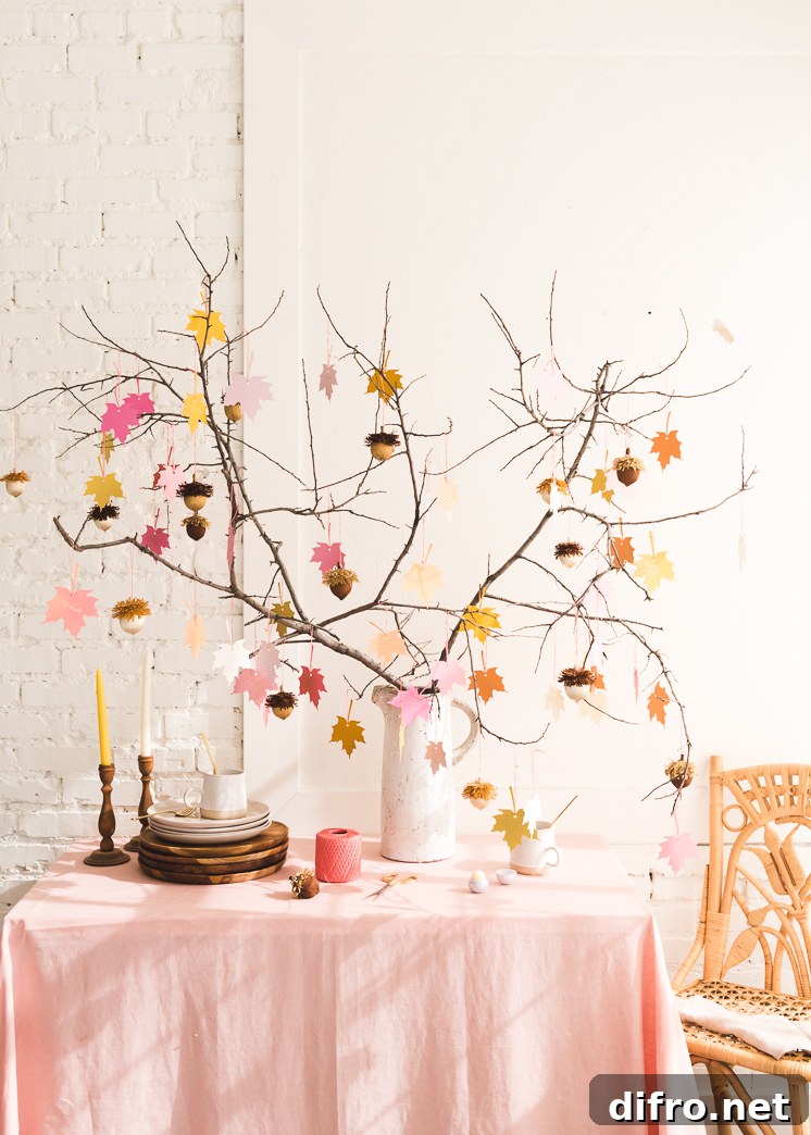 Gratitude tree centerpiece with small ornaments and natural accents