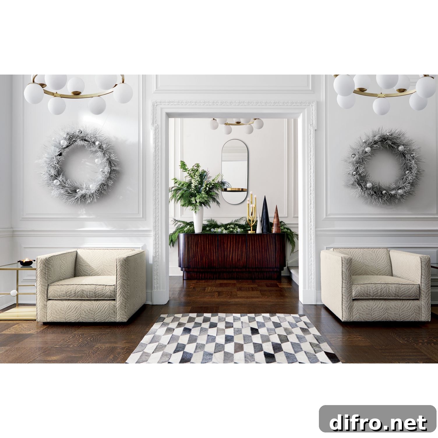Glamorous holiday interior with flocked wreath and layered decor