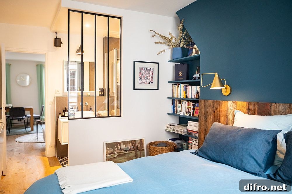 Bluish-gray accent wall in a modern bedroom