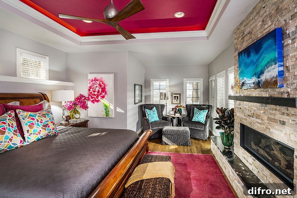 Modern bedroom with a dark maroon painted ceiling