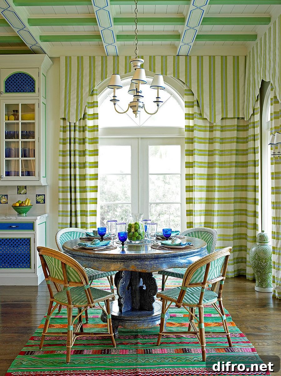Mediterranean dining room with striped green walls