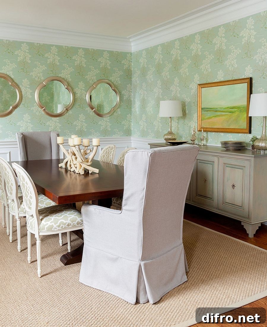 White and green dining room with wallpaper