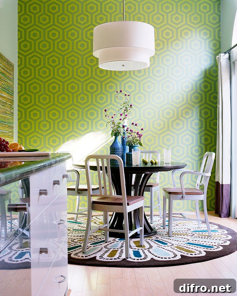 Small dining room with Hicks-inspired green pattern