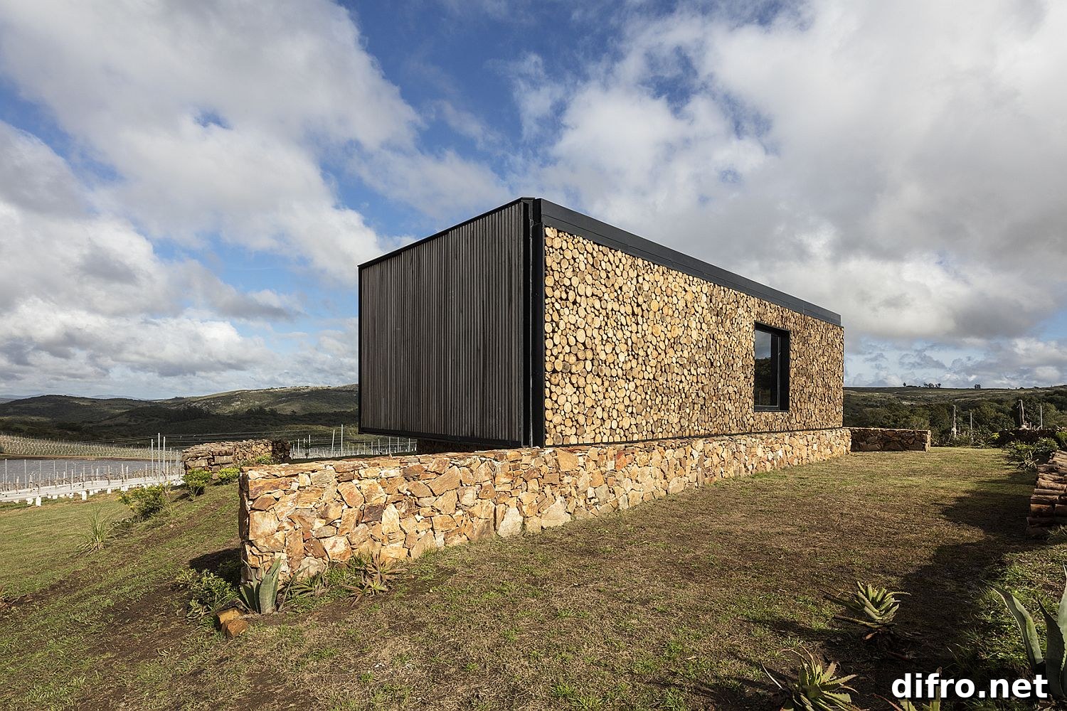 Stone, glass and wood exterior of the cabin