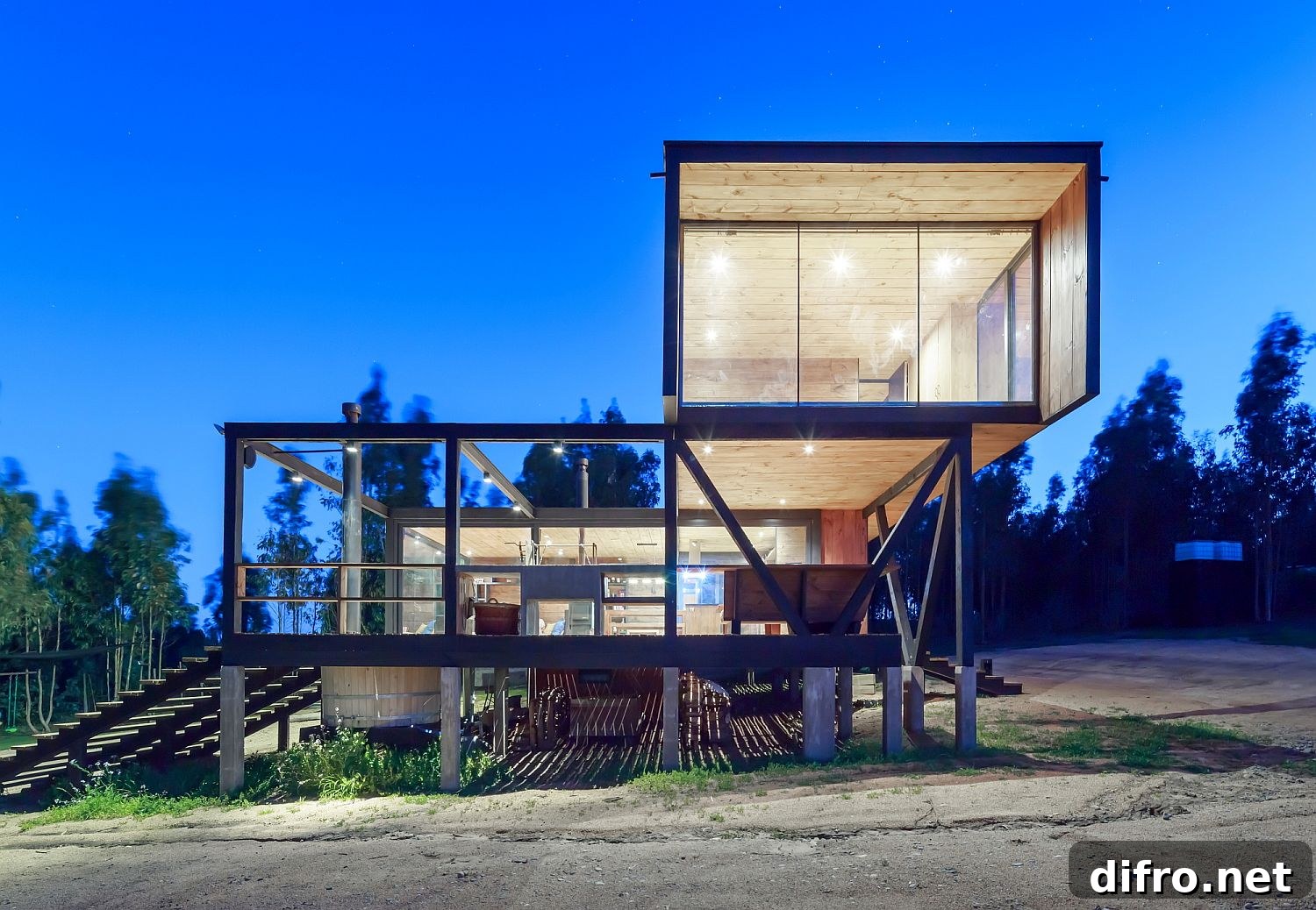 Cantilevered contemporary home in Chile with a view of La Boca town in the distance