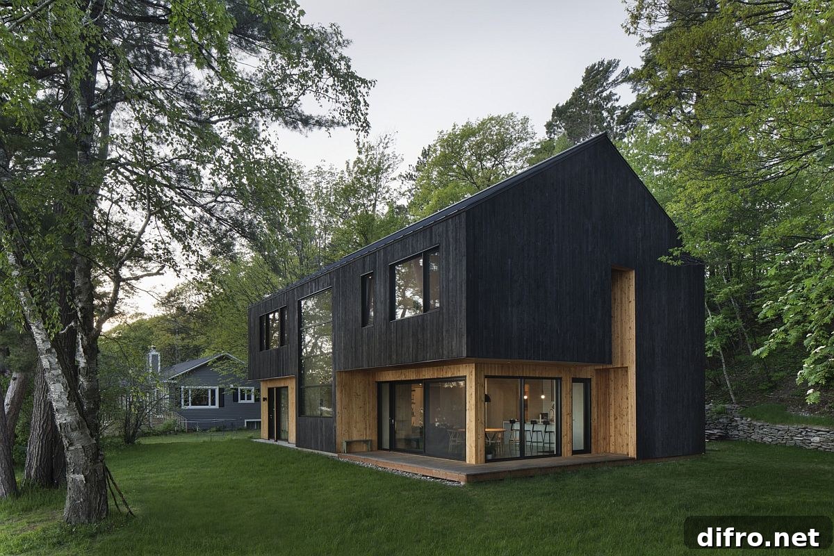 Larch in two different finishes shapes the exterior of the house along with glass