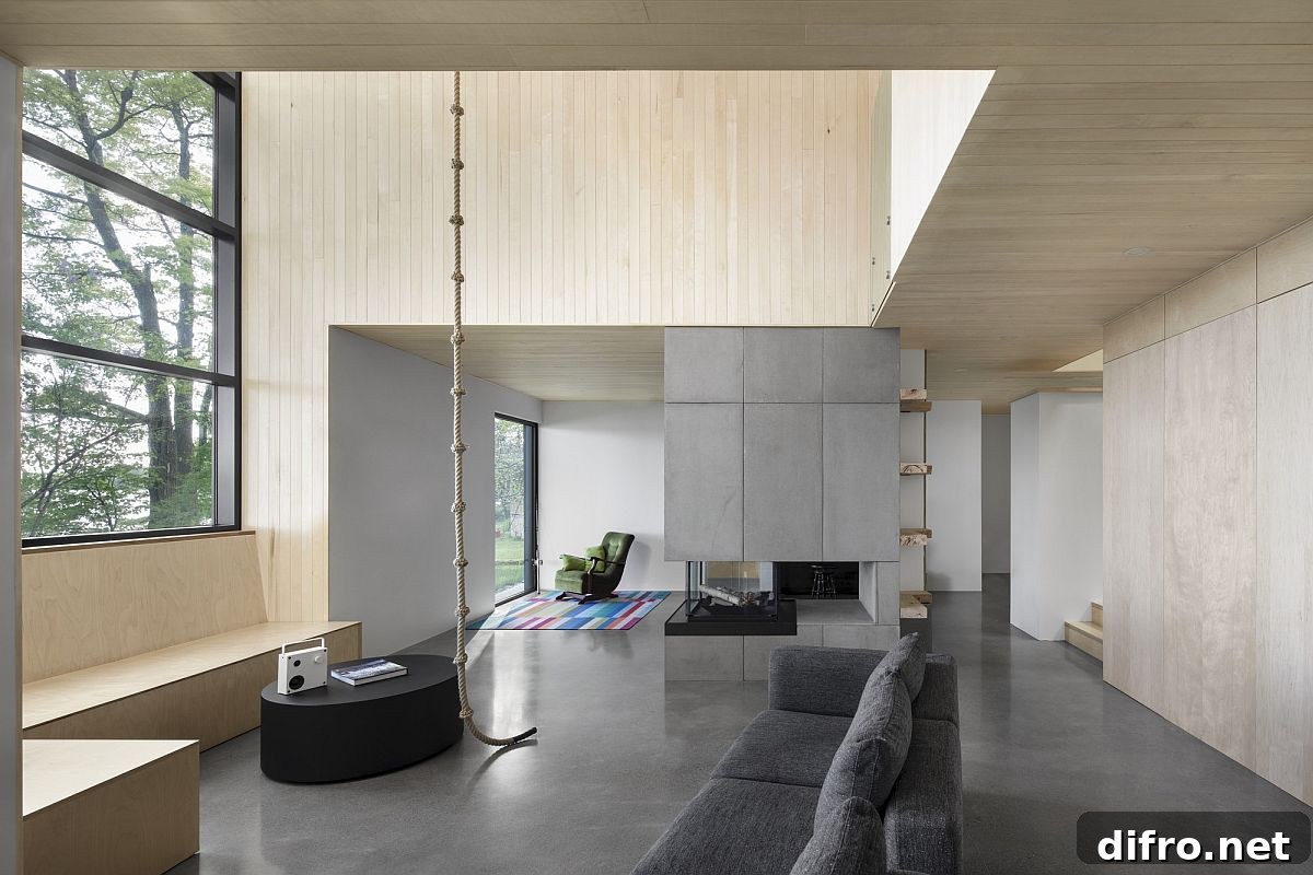 Minimal and contemporary interior of the cabin with a view of the lake promotes leisure lifestyle
