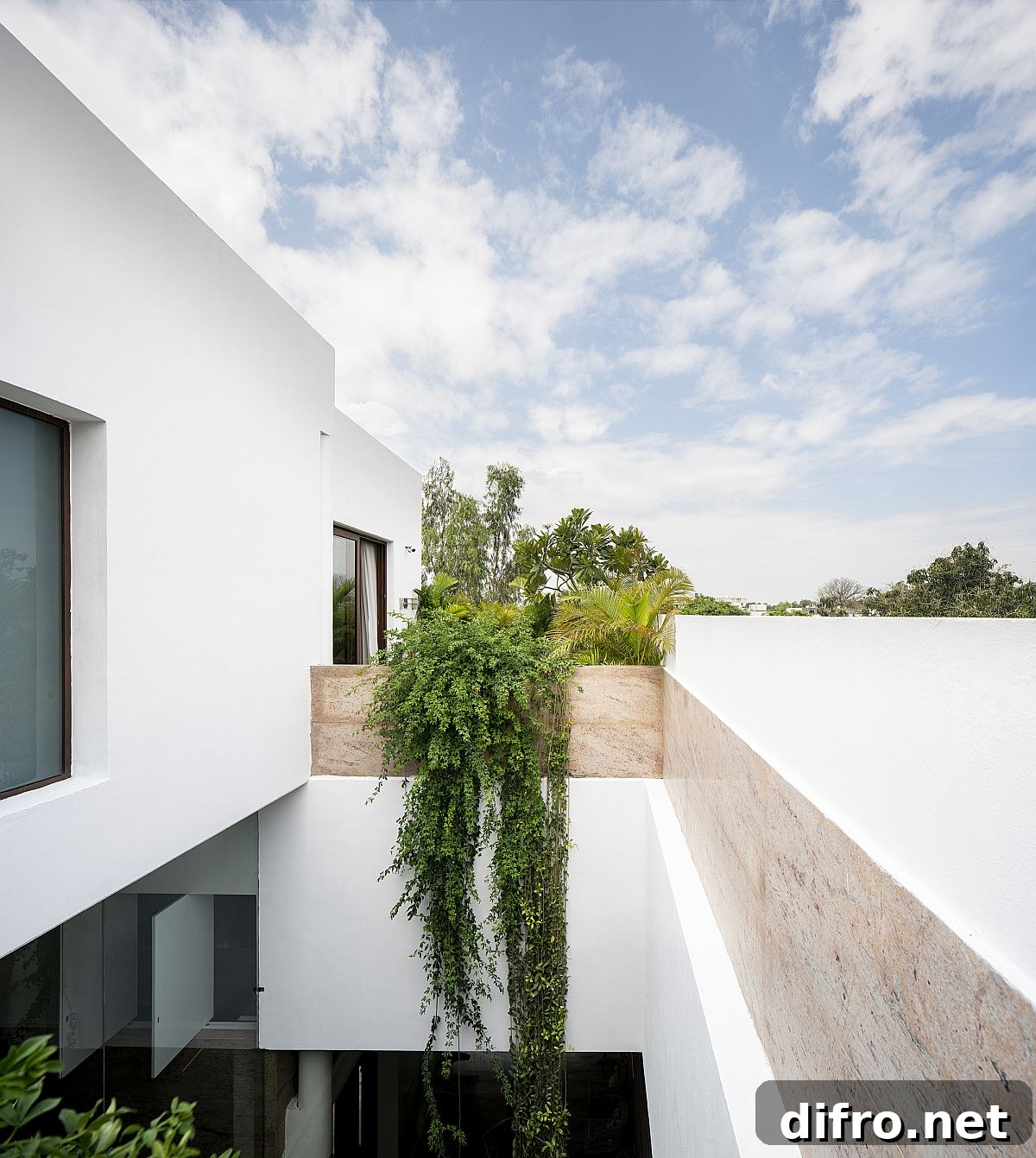Terrace gardens that flow indoors, adding freshness and calm
