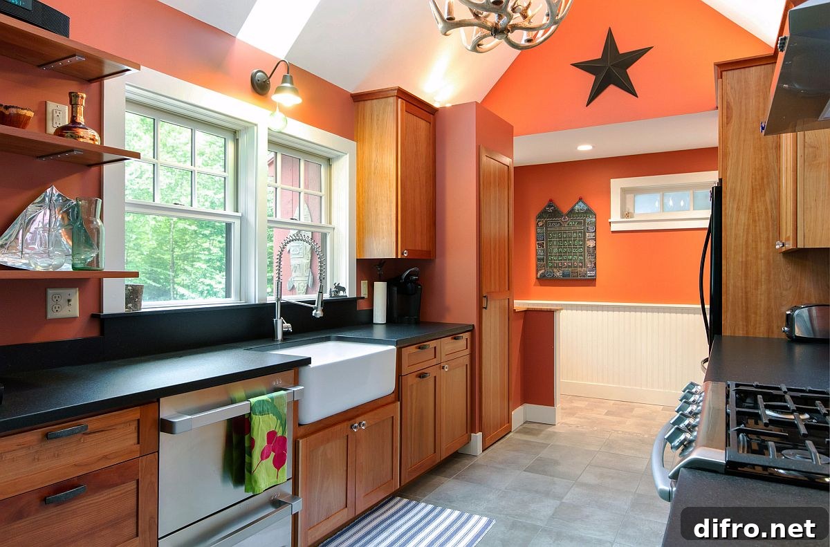 Orange accents in a spacious rustic kitchen