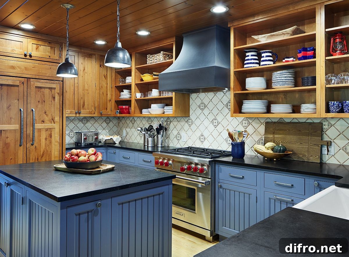 Blue cabinets and island with wooden shelves in a functional rustic kitchen