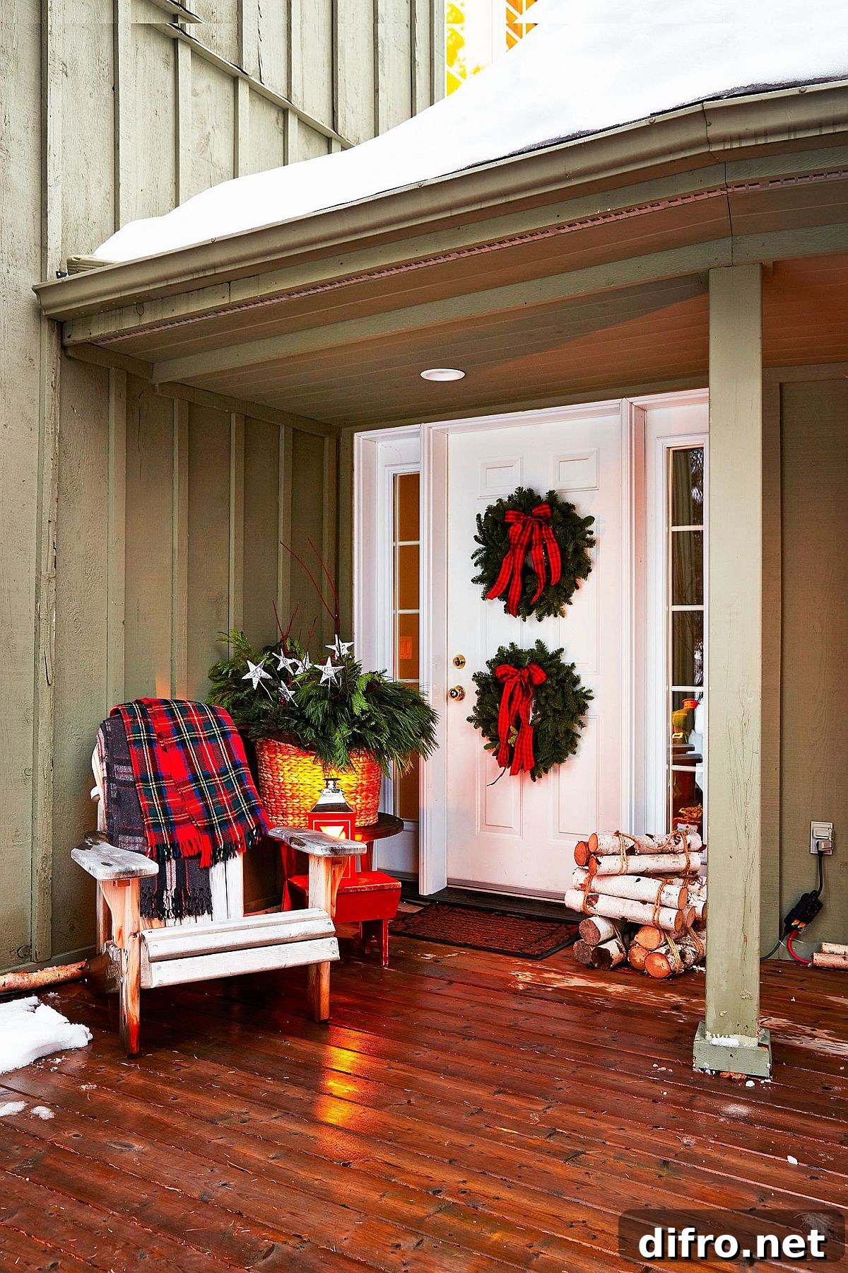 Plaid wreath and greenery on festive porch