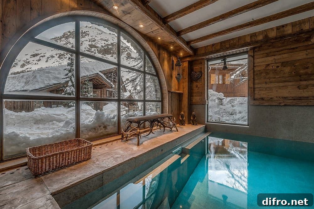 Indoor pool with snowy views