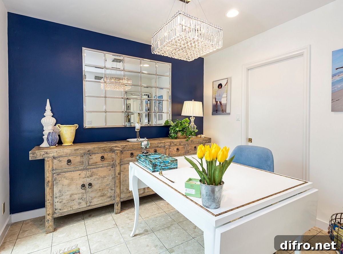 Radiant blue wall in a white living space with a home office